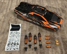 Porca de roda Traxxas XRT corpo laranja GTX amortecedores médios eixo de alumínio comprar usado  Enviando para Brazil