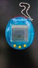Tamagotchi bleu transparent d'occasion  Tours-sur-Marne