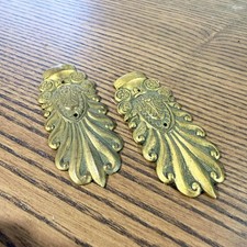 Paire ornements bronze d'occasion Paire ornements bronze d'occasion  Saint-Genest-Malifaux