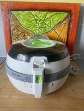 Tefal Oryginalna frytkownica powietrzna Actifry 001 S. Działająca, ale stiukowane przyciski timera. na sprzedaż  Wysyłka do Poland