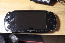 PSP console black 1003 (with charger, battery and cover) na sprzedaż  Wysyłka do Poland