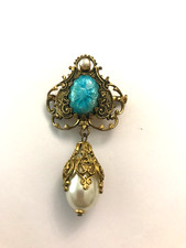 Broche métal doré d'occasion  Cernay