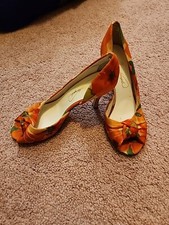Michaelangelo orange floral for sale  Wapello