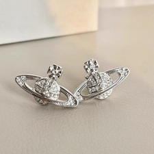 Vivienne westwood earrings d'occasion  Expédié en Belgium