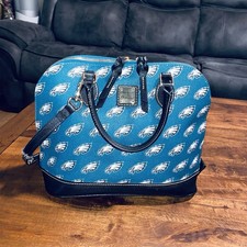 Dooney bourke double d'occasion  Expédié en Belgium