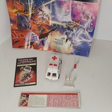 Transformers Ratchet 1982-com folha de especificações técnicas, livreto de instruções, todos os acessos. comprar usado  Enviando para Brazil