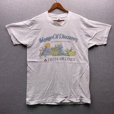 Camiseta masculina vintage Gullivers Travels Delta Airlines L Voyage of Discovery 92 rosas comprar usado  Enviando para Brazil
