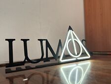 Insegna neon lumos. usato  Marciano della Chiana