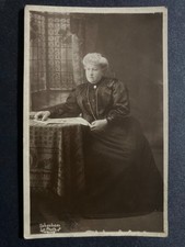 Lady seated reading for sale Lady seated reading for sale  WORKINGTON