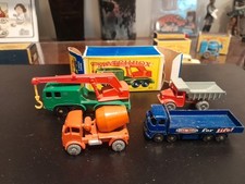 Grúa de ocho ruedas Matchbox #30 con caja y otros 3 vehículos de construcción segunda mano  Embacar hacia Mexico