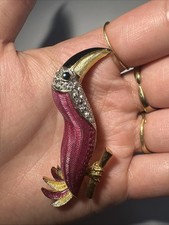 Broche toucan dorée d'occasion  Andernos-les-Bains