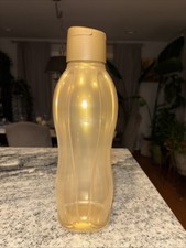 Usado, Garrafa Tupperware grande ECO água 1 L/ 34 oz em ouro flip top comprar usado  Enviando para Brazil