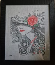 Quadro donna con usato  Seniga