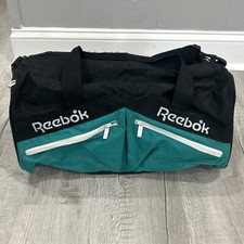 Bolsa de ginástica vintage Reebok Duffle preta e azul-petróleo 18" alça de ombro atlética comprar usado Bolsa de ginástica vintage Reebok Duffle preta e azul-petróleo 18" alça de ombro atlética comprar usado  Enviando para Brazil