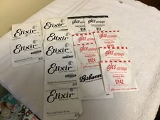 15 pacotes de cordas de guitarra sortidas 7ghs, 1 Gibson e 7 elixir comprar usado  Enviando para Brazil