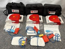 Dispositivo de treinamento AED da Cruz Vermelha Americana em inglês/espanhol **LEIA** comprar usado  Enviando para Brazil