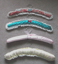 Size coathangers covered for sale  LINCOLN