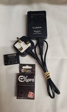 Lumix Panasonic DE-A66 ładowarka i przewód zasilający oraz 2 baterie w bardzo dobrym stanie na sprzedaż  Wysyłka do Poland