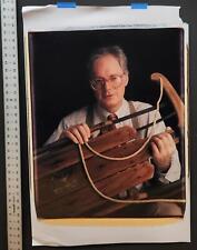 1990 man holding for sale  New York