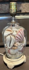 Seashell filled glass for sale  Gridley