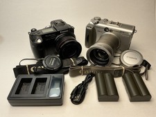 Two canon cameras d'occasion  Expédié en Belgium