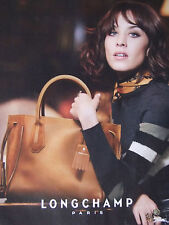 Press advertising longchamp d'occasion  Expédié en Belgium