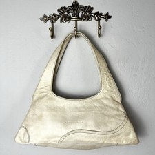 Coccinelle gold leather d'occasion  Expédié en Belgium