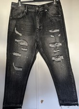 Jeans strappati uomo usato  Piacenza