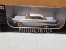 Anson Prestige 1957 Plymouth Fury em escala 1/18. capô aberto, portas e porta-malas. Azul bebê comprar usado  Enviando para Brazil