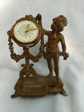 Petite pendule putti d'occasion  Aimargues