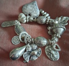 Bracelet vintage breloques d'occasion  Le Chesne