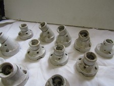 Lot appliques porcelaine d'occasion Lot appliques porcelaine d'occasion  Rougé