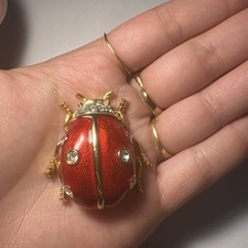 Broche coccinelle dorée d'occasion  Andernos-les-Bains