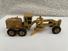 Usado, Raspador de motoniveladora articulado ERTL Diecast Caterpillar CAT 12G em escala 1/64 comprar usado  Enviando para Brazil