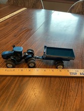 Trator New Holland Tj450 com carrinho de grãos Kinze 840 comprar usado  Enviando para Brazil