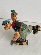 1950's VINTAGE LINEMAR TIN WINDUP POPEYE PATINS SEM CAIXA comprar usado  Enviando para Brazil