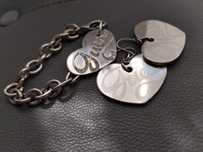 Bracciale orecchini guess usato  Erula