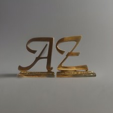 Messing buchstützen motiv gebraucht kaufen  Köln