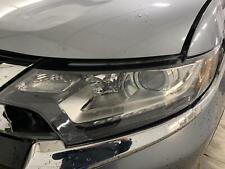 Used left headlight d'occasion  Expédié en Belgium
