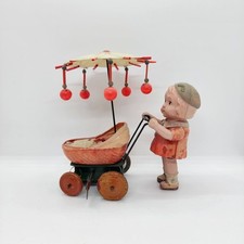 Carrinho de bebê vintage celulóide criança empurrando bebê com dossel brinquedo de corda comprar usado  Enviando para Brazil