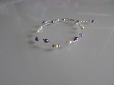 Bracelet crème blanc d'occasion  Saint-Maixent-l'École