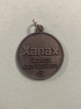 Chaveiro Xanax vintage década de 1980 lembrança farmacêutica representante de medicamentos publicidade comprar usado  Enviando para Brazil