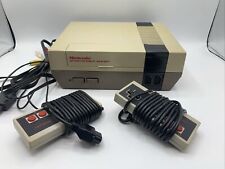 Sistema de entretenimiento Nintendo NES-001 *no incluye cable de alimentación segunda mano  Embacar hacia Mexico