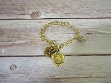 "Pulsera Dije Lumos de la Colección Hufflepuff de Harry Potter - 8" segunda mano  Embacar hacia Argentina