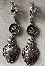 Silver earrings sacred usato  Torino