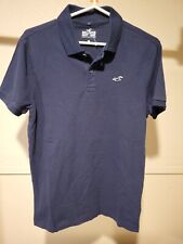Camisa polo masculina Hollister pequena marinha manga curta logotipo golfe desempenho fenda comprar usado  Enviando para Brazil
