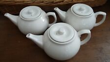 Three purewhite teapots for sale  LEIGH