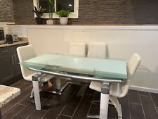 Mesa de cocina de vidrio blanco con 6 sillas y gabinete de licor de vidrio a juego segunda mano  Embacar hacia Argentina