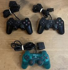 LOTE de 3 controladores Sony PlayStation 2 negro verde esmeralda TAL CUAL - PIEZAS/REPARACIÓN, usado segunda mano  Embacar hacia Argentina