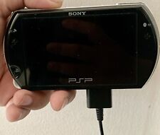 Sistema portátil Sony PlayStation PSP Go - consola negra con cargador segunda mano  Embacar hacia Argentina
